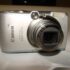 Canon IXUS 970 IS Compact Digital Camera 10.0MP Silver point and shoot retro camera with original charger and battery - Tested and Working