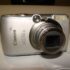 Canon IXUS 970 IS Compact Digital Camera 10.0MP Silver point and shoot retro camera with original charger and battery - Tested and Working