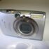 Canon IXUS 970 IS Compact Digital Camera 10.0MP Silver point and shoot retro camera with original charger and battery - Tested and Working