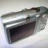 Canon IXUS 970 IS Compact Digital Camera 10.0MP Silver point and shoot retro camera with original charger and battery - Tested and Working